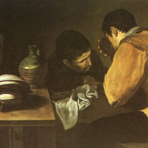Two Young Men At A Table