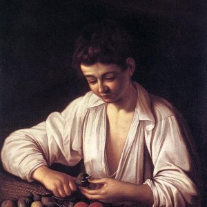 Boy Peeling a Fruit
