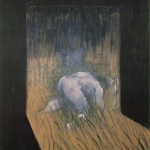 Man kneeling in grass