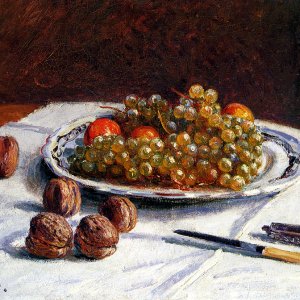 Grapes And Walnuts On A Table